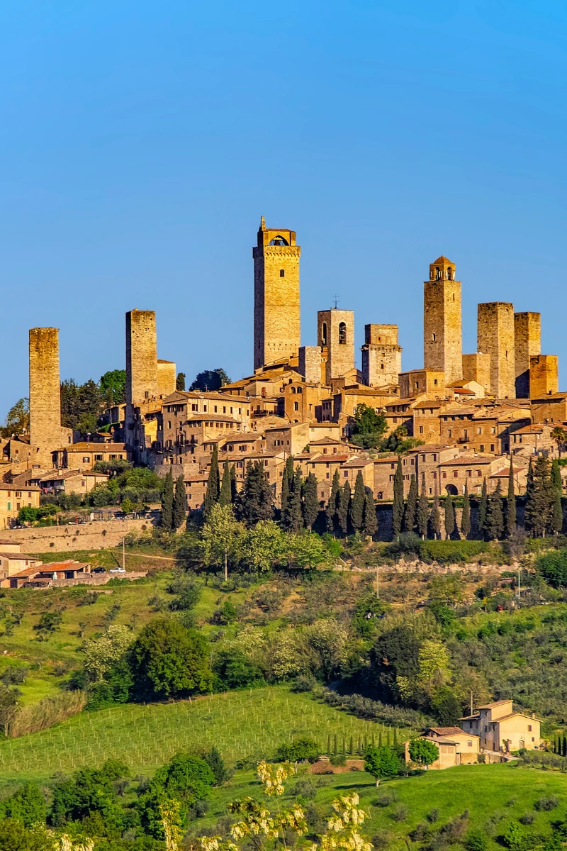 Tuscan countryside with cypress trees and rolling hills